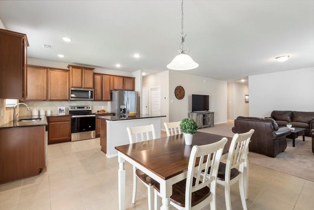 tiled dining space with sink