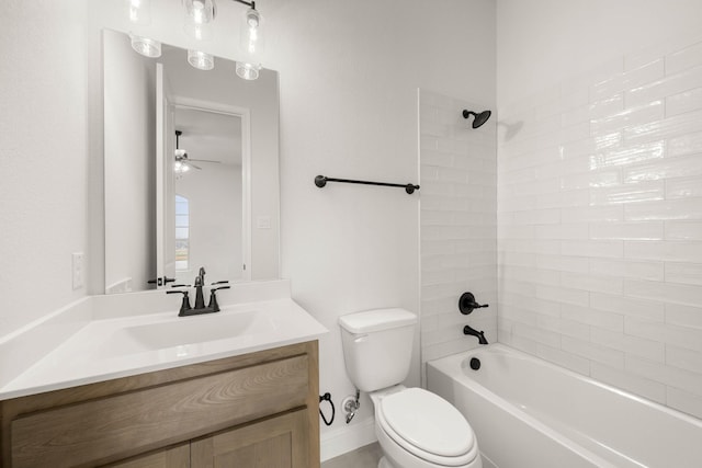 full bath with bathtub / shower combination, vanity, toilet, and a ceiling fan