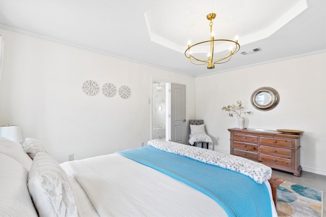 bedroom featuring an inviting chandelier, a tray ceiling, and crown molding