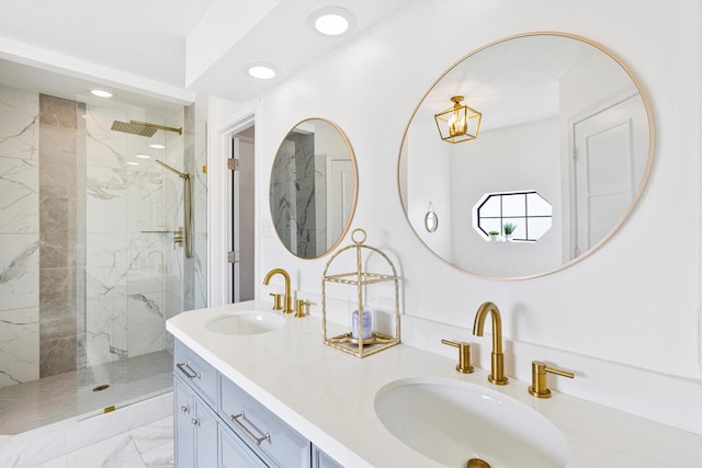 bathroom with vanity and a tile shower