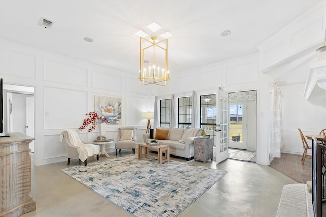 living room with a chandelier