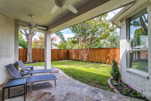 view of patio with ceiling fan