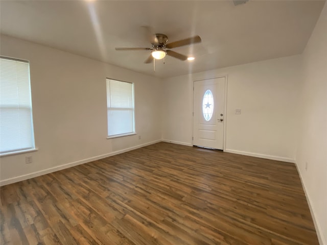 entrance foyer with ceiling fan and dark hardwood / wood-style flooring