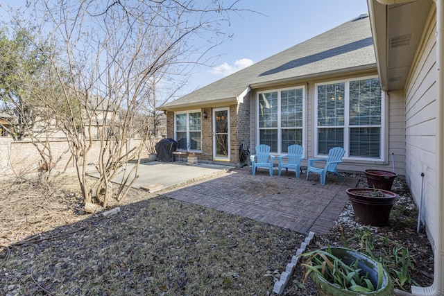 view of yard featuring fence and a patio area