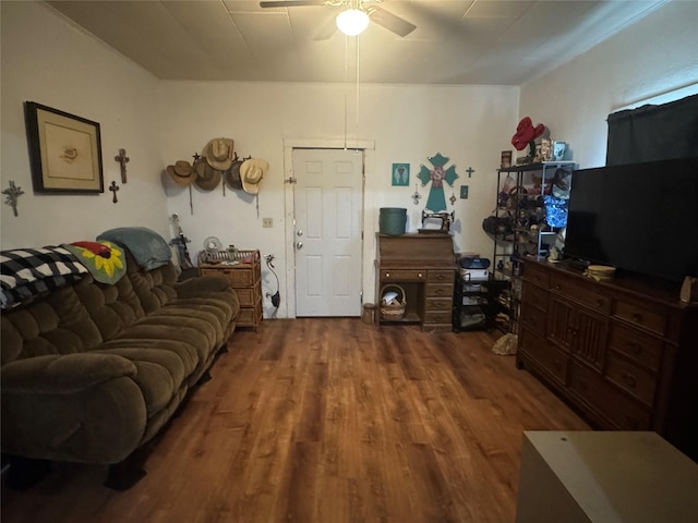 living room with hardwood / wood-style floors and ceiling fan