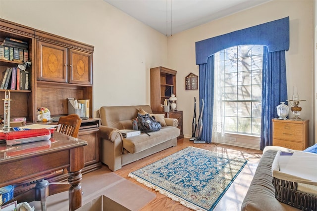 sitting room with light hardwood / wood-style flooring