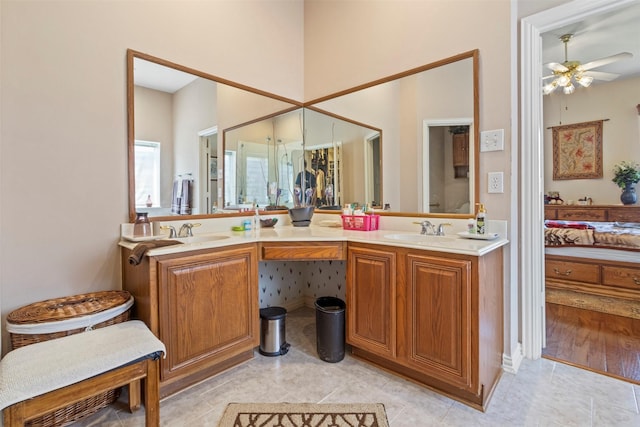 bathroom featuring vanity, tile patterned floors, and ceiling fan