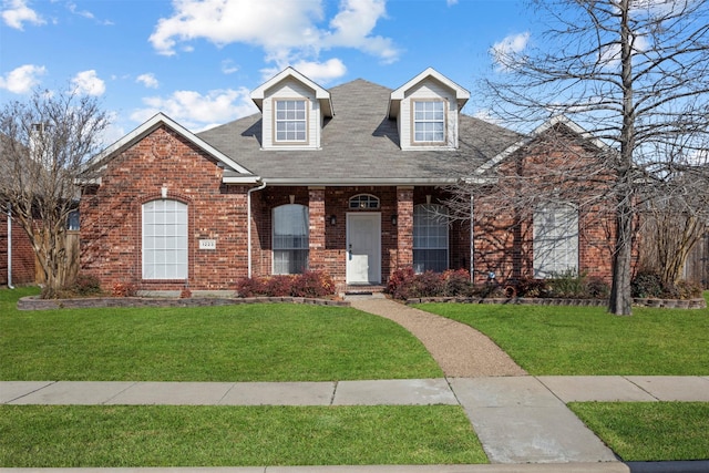 view of front of home with a front yard