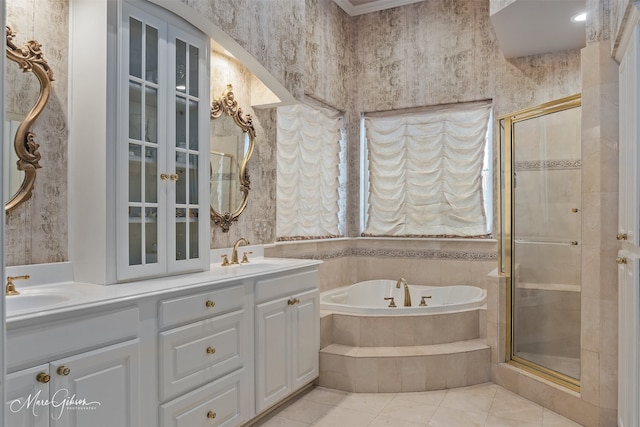 bathroom with tile patterned flooring, vanity, and separate shower and tub