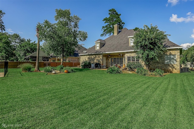 view of yard featuring central AC