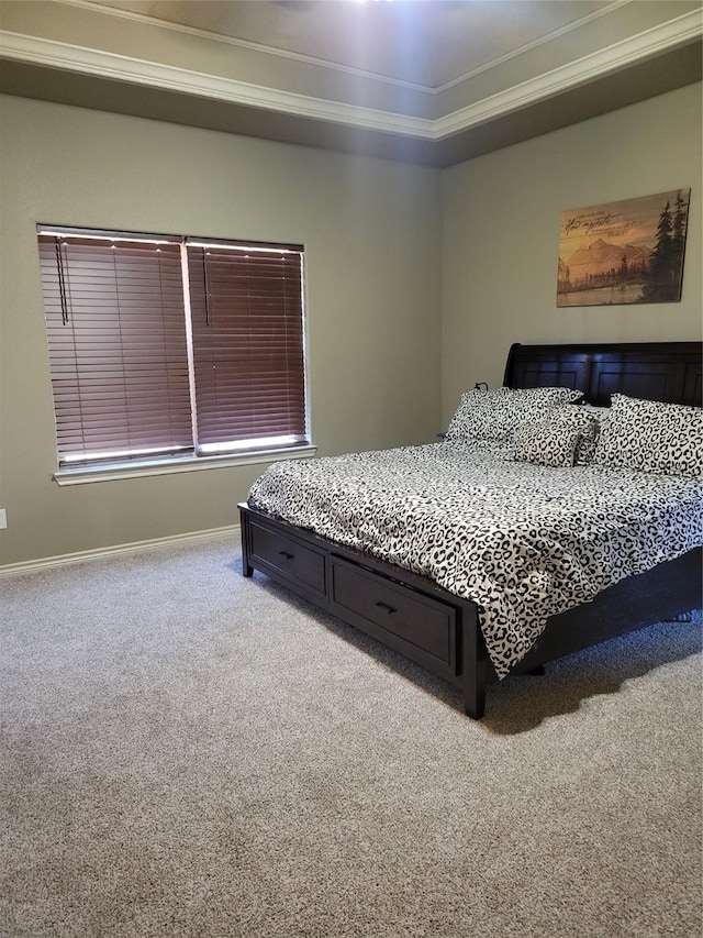 carpeted bedroom with ornamental molding