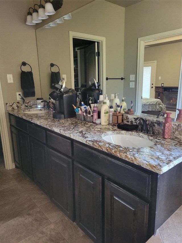 bathroom with vanity and tile patterned floors