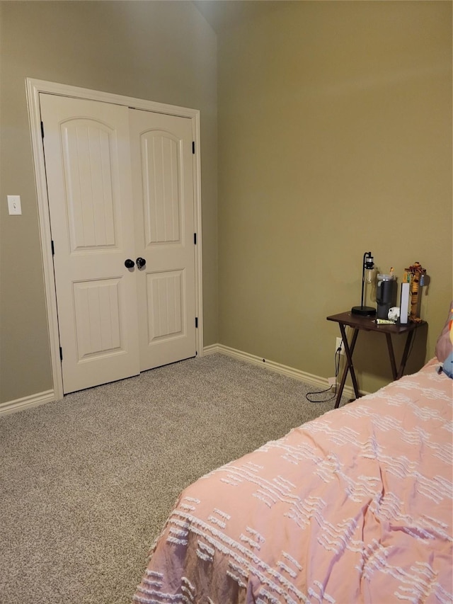 bedroom with a closet and carpet