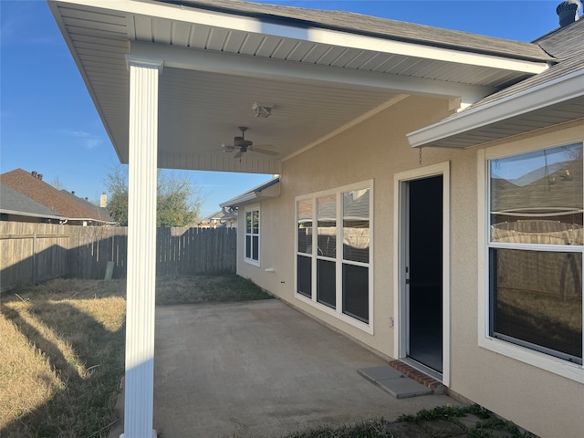 view of patio / terrace with a fenced backyard and ceiling fan