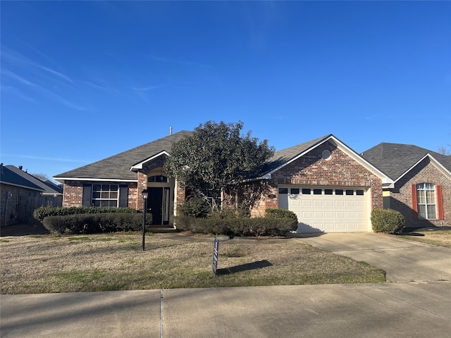 view of front of home featuring concrete driveway, brick siding, a front lawn, and an attached garage