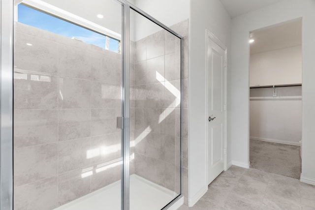 bathroom featuring an enclosed shower