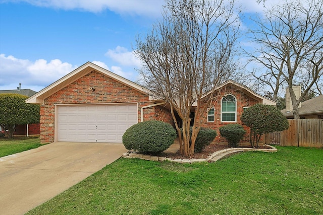 view of front of home with a garage and a front yard