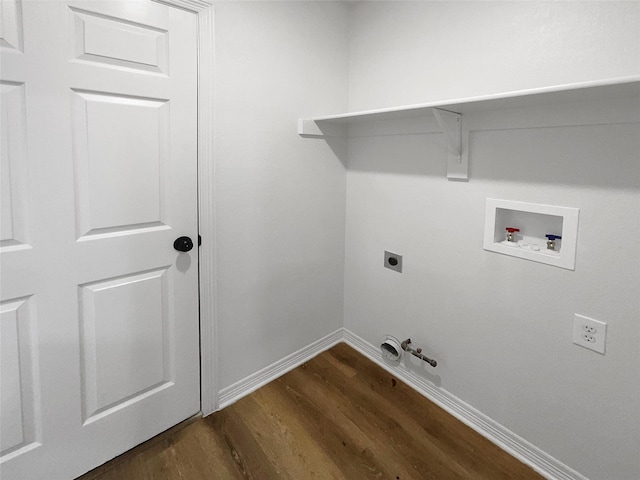 clothes washing area featuring hookup for a gas dryer, electric dryer hookup, washer hookup, and dark hardwood / wood-style flooring