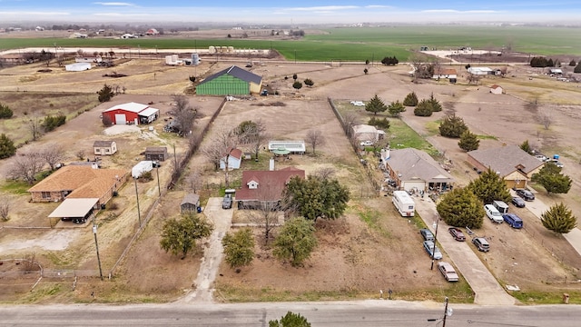 birds eye view of property featuring a rural view