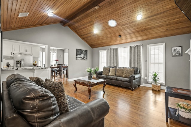 living room with wood ceiling, high vaulted ceiling, beam ceiling, and light hardwood / wood-style floors