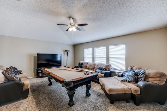 game room with billiards, ceiling fan, carpet flooring, a textured ceiling, and vaulted ceiling