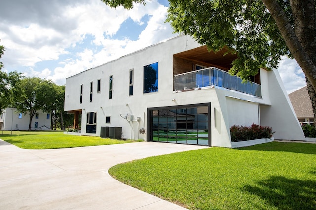 view of building exterior with central AC