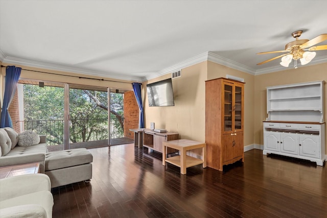 living room featuring crown molding, dark hardwood / wood-style floors, and ceiling fan