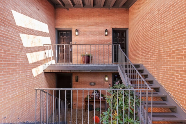 doorway to property with a balcony