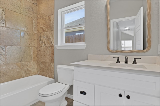 full bathroom featuring vanity, toilet, and visible vents