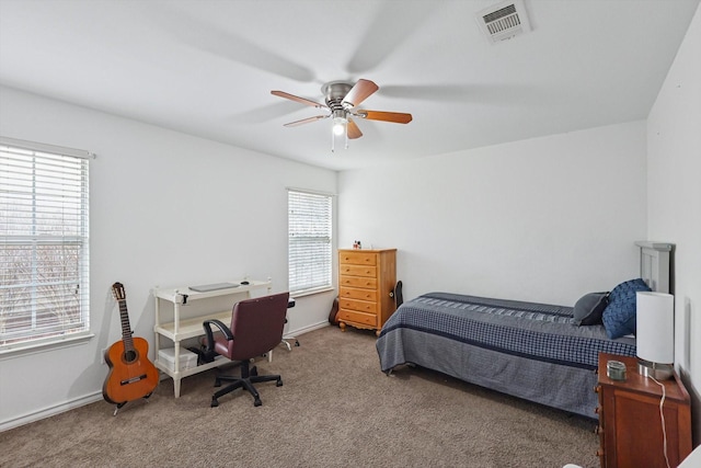 bedroom featuring ceiling fan and carpet floors