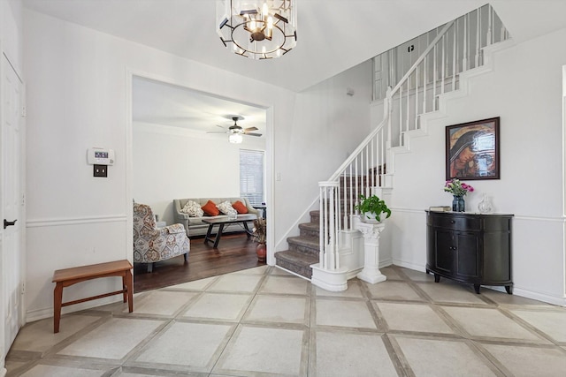 entryway featuring a chandelier