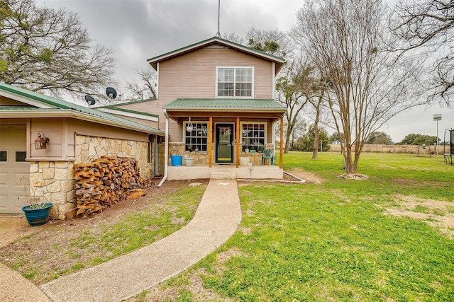 view of front of home featuring a porch and a front lawn