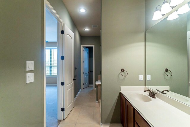 bathroom with vanity and tile patterned floors