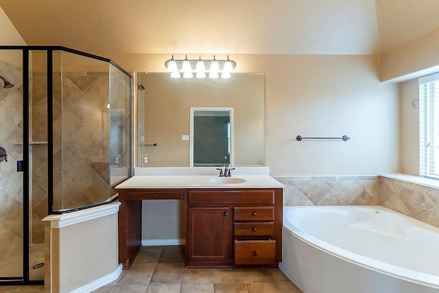 bathroom with independent shower and bath, vanity, and tile patterned flooring