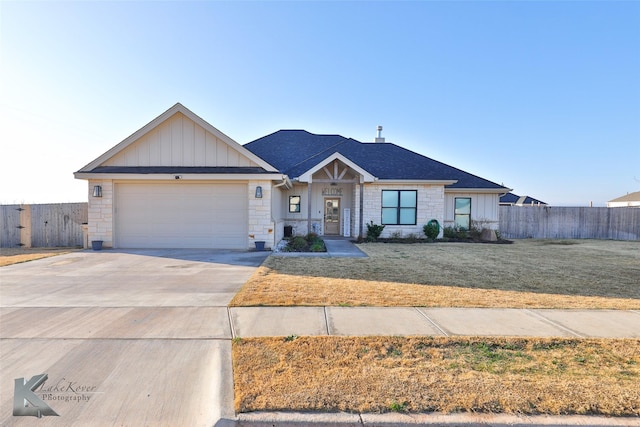 single story home with a garage and a front lawn