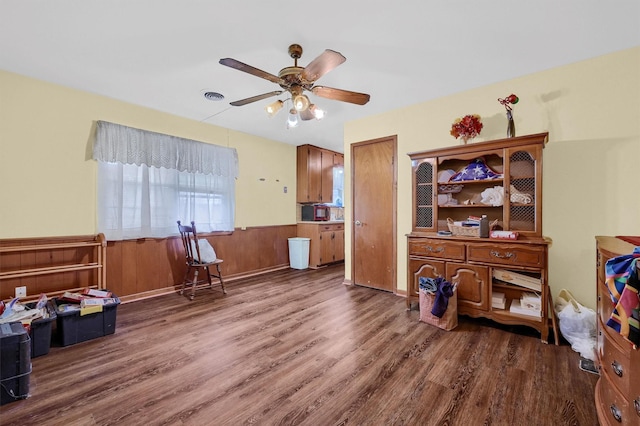 misc room with hardwood / wood-style flooring and ceiling fan