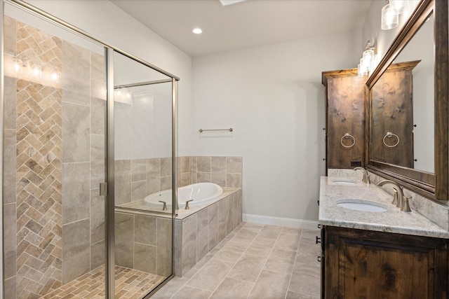 bathroom featuring vanity, tile patterned floors, and independent shower and bath