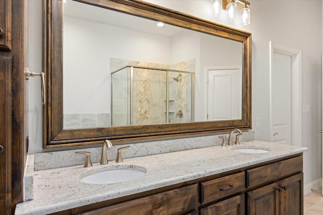 1476 Highland Park Cir, Granbury, TX 76048 - full bathroom featuring a stall shower, double vanity, and a sink