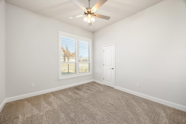 carpeted empty room with ceiling fan