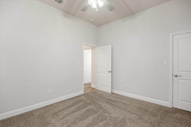 1476 Highland Park Cir, Granbury, TX 76048 - unfurnished room featuring light colored carpet, visible vents, baseboards, and a ceiling fan