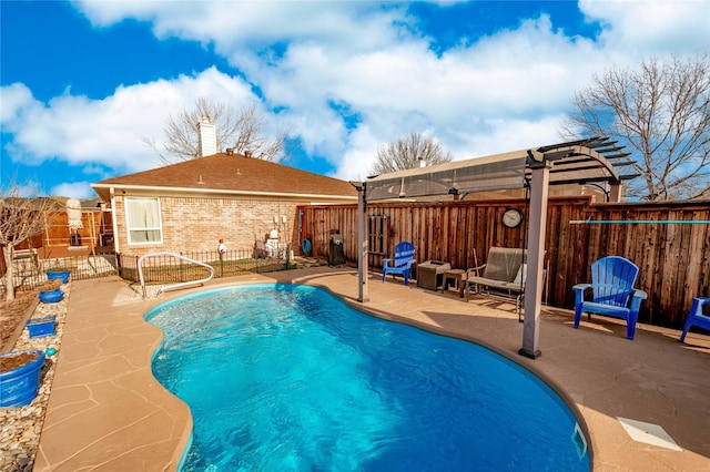 view of pool with a pergola and a patio