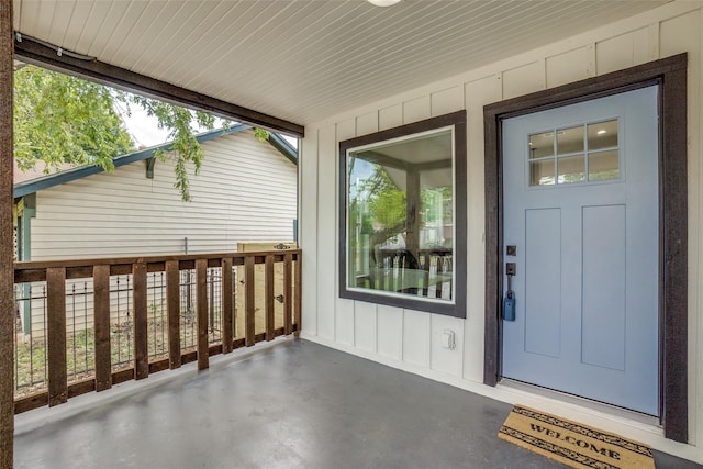 entrance to property with a porch