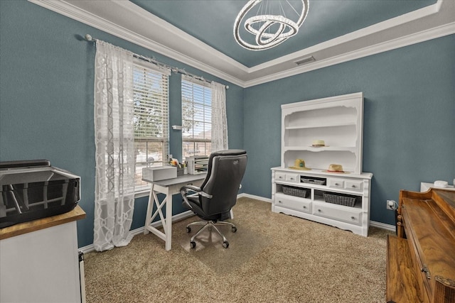 carpeted office space with visible vents, baseboards, ornamental molding, an inviting chandelier, and a raised ceiling