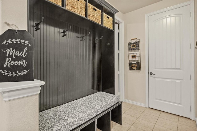 mudroom with tile patterned flooring