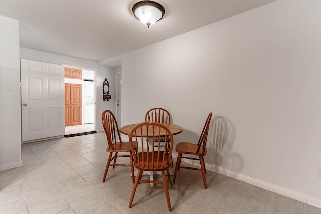 view of tiled dining room