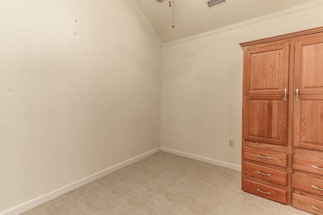 spare room with crown molding