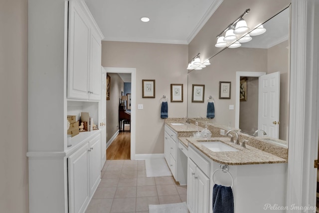 bathroom featuring vanity, ornamental molding, and tile patterned floors