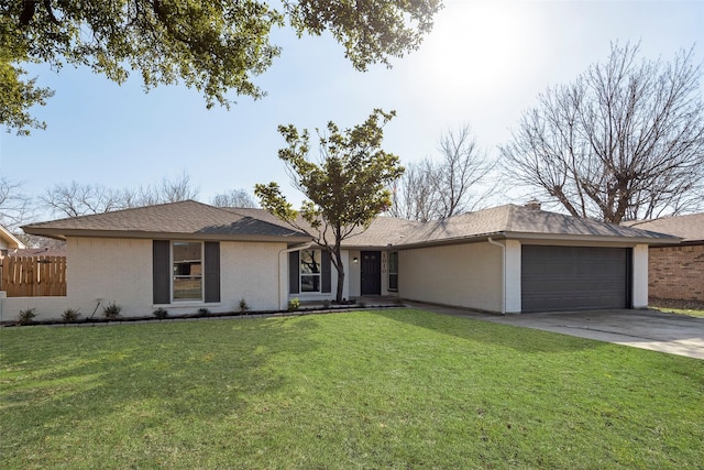 single story home with a garage and a front yard