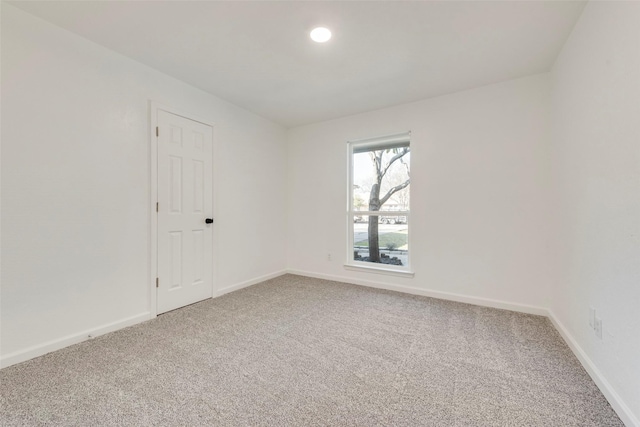 view of carpeted spare room