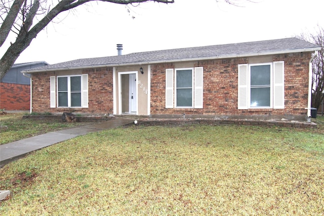 single story home with a front lawn